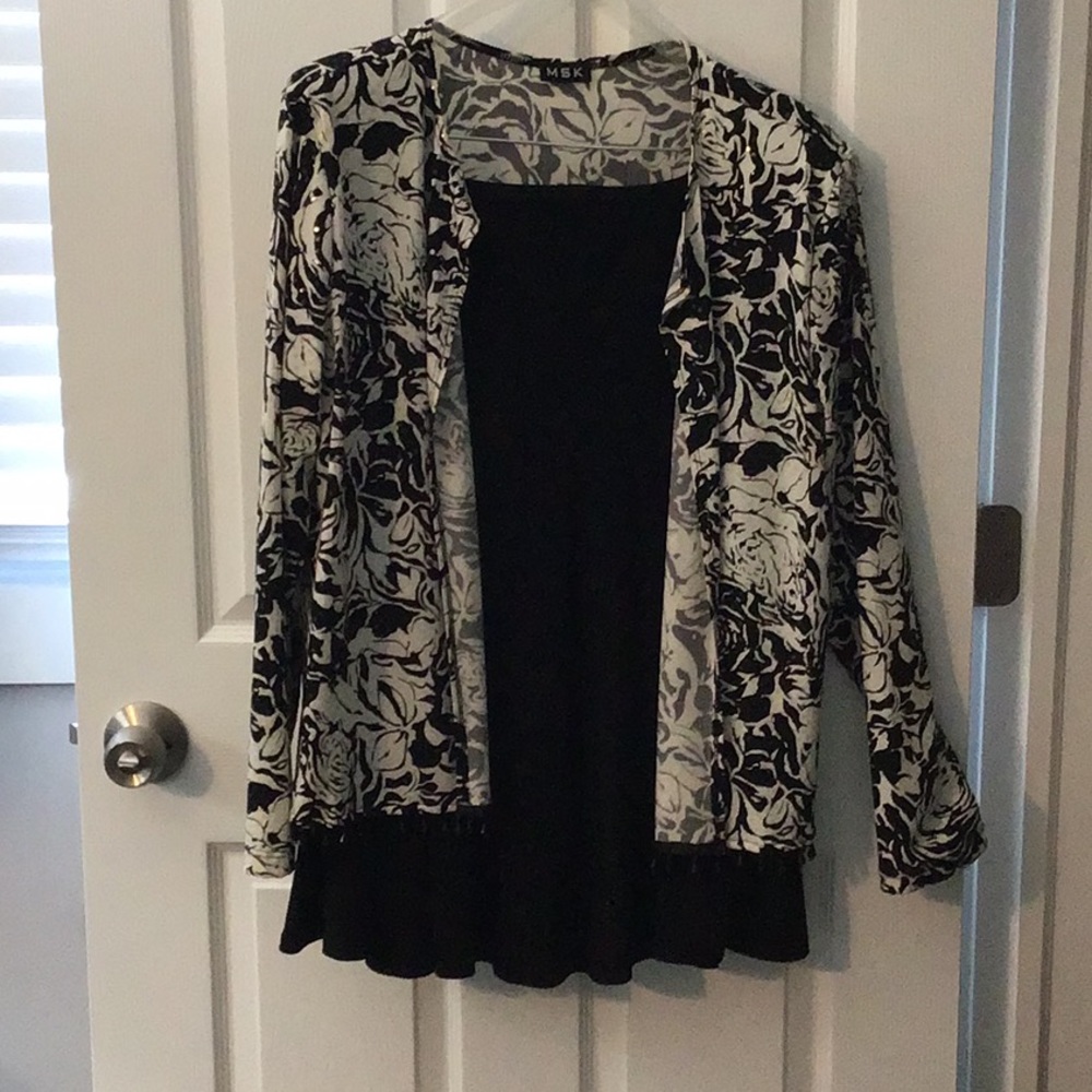 Evening jacket and black skirt